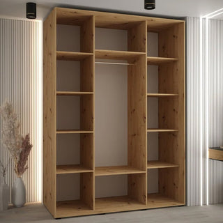 Open artisan oak wardrobe interior with shelves and hanging rail