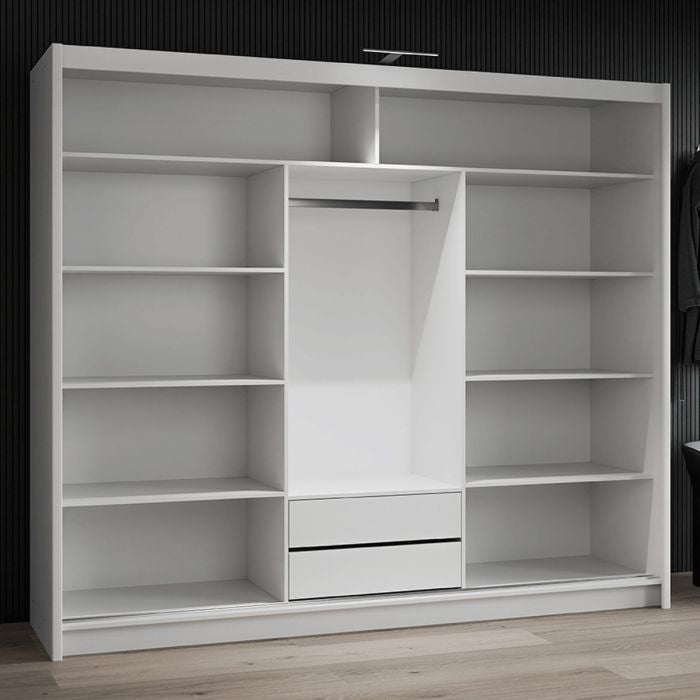 White 3-door sliding wardrobe interior with open shelves, hanging rail and two drawers