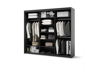 Open black wardrobe interior with clothes on hangers, folded items on shelves, and storage boxes.