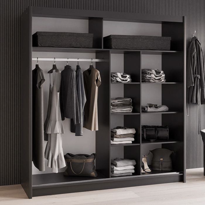 Black 2-door sliding wardrobe with one mirrored door showing hanging clothes and shelves.