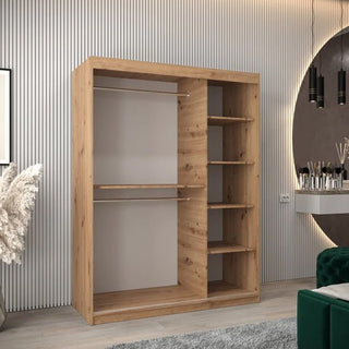 The Tavira I Mirrored Wardrobe with 2 sliding doors (150cm) in artisan oak features two hanging rods on the left and five shelves on the right, perfect for a modern room with a decorative wall and round mirror.
