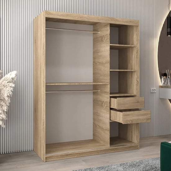 Sonoma Oak 150cm sliding door wardrobe showing one hanging rail, shelves and two drawers visible inside.