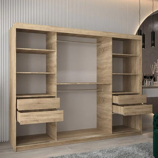 The Tavira I Mirrored Wardrobe with 3 sliding doors (250cm) in Sonoma Oak, featuring two hanging rods, shelves, and four drawers, stands in a modern room with a striped wall and decorative lighting behind it.