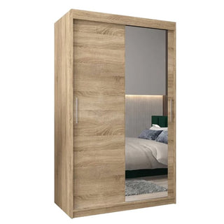 The Tavira II Mirrored Wardrobe features 2 sliding doors in Sonoma Oak, measuring 120cm, with a large rectangular mirror on one door and a plain white background.