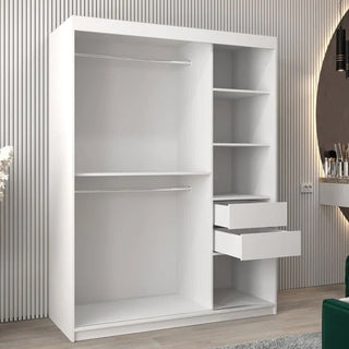 The Tavira II Mirrored Wardrobe with 2 sliding doors in white features two hanging rods on the left, three shelves and two open drawers on the right, standing in a room with light wood flooring and a striped wall.