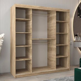The Tavira II Mirrored Wardrobe with 2 sliding doors in Sonoma Oak (180cm) boasts a spacious, modern design with multiple shelves and twin hanging rods, adding style and function to contemporary spaces.