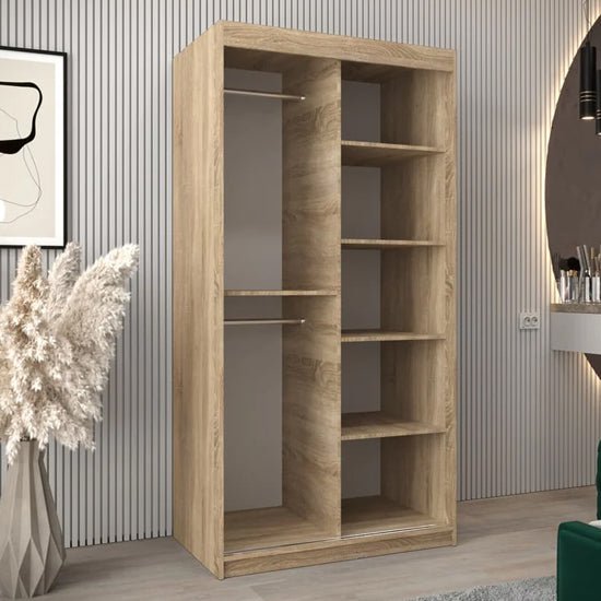 Tavira III 100cm Sonoma Oak sliding door wardrobe with 2 doors, showing internal shelves and hanging rails.