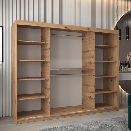 Tavira 250cm Artisan Oak wooden wardrobe with 3 sliding doors and open shelving.