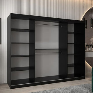 A spacious Tavira Wooden Wardrobe 3 Sliding Doors 250cm in Black features multiple side shelves and two central hanging rods, ideal for organizing clothes, set stylishly against modern vertical paneling on a light wood floor.