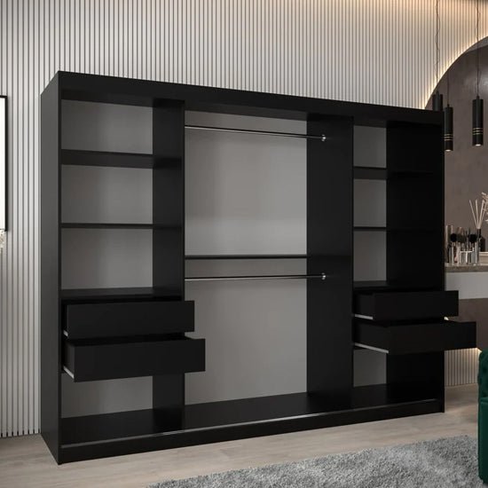 Tavira 250cm black sliding wardrobe with shelves and two drawers visible on each side.