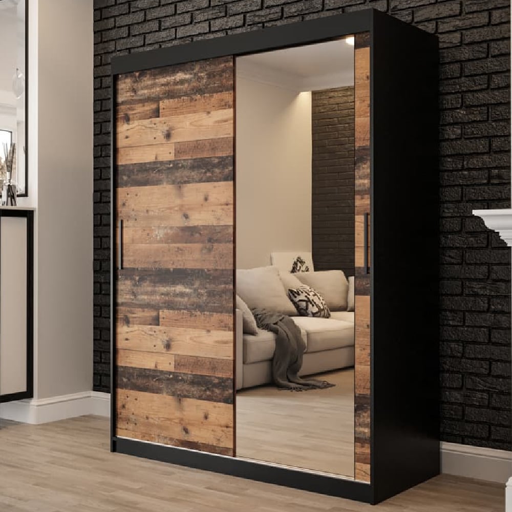 TOPEKA 1 MIRRORED 150CM SLIDING WARDROBE in dark oak with one mirrored door reflecting a sofa.