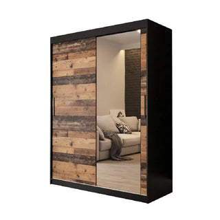 The Topeka 1 Mirrored 150cm Wardrobe with 2 sliding doors in dark oak, featuring one rustic wood panel door and one full-length mirror door, stands against a white background reflecting a modern living room with a beige sofa.