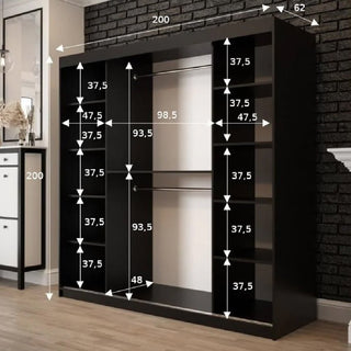 The Topeka 2 Mirrored 200cm Wardrobe in Dark Oak features two sliding doors, three sections with open compartments and hanging bars. White arrows indicate shelf, width, and height dimensions in cm. Set against a brick wall and cabinet background.