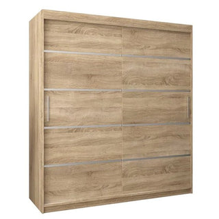 The Vevey I Wooden Wardrobe features 2 large sliding doors with horizontal metallic accents and vertical handles. Made in sonoma oak, it offers a simple, modern design and measures 180cm wide.