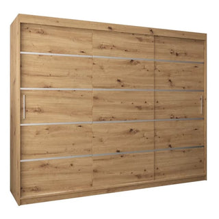 The Vevey I Wooden Wardrobe features an Artisan Oak finish, three sliding doors with horizontal metallic accent strips, and vertical handles on the left and right doors. Dimensions: 250cm wide.