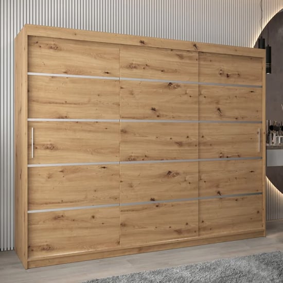 VEVEY I Artisan Oak wooden wardrobe with 3 sliding doors, silver handles and metallic accents.