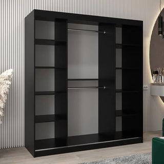 The Vevey II Mirrored Wardrobe with 2 sliding doors in black (180cm) features multiple side shelves and central hanging rods, shown against a light, vertically-striped wall in a modern room.