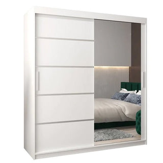 The Vevey II Mirrored Wardrobe features two 180cm white sliding doors—one solid, one mirrored—adding a modern touch to your bedroom décor.