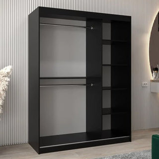 The Vevey III Mirrored Wardrobe, 150cm wide with 2 sliding doors in black, features two hanging rods on the left and five shelves on the right—ideal for modern rooms and perfectly complements a light, vertically-striped wall.