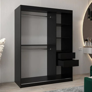 The Vevey III Mirrored Wardrobe with 2 sliding doors (150cm, black) features two left-side hanging rods, right-side shelves, and two partially open drawers. It's shown in a room with light striped walls and a wooden floor.