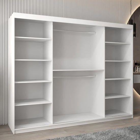 CHOICEWARDROBE Vevey III 250cm white mirrored sliding door wardrobe interior with shelves and hanging rails.