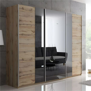 3-door sliding wardrobe in Oak Wotan finish with mirrored central doors
