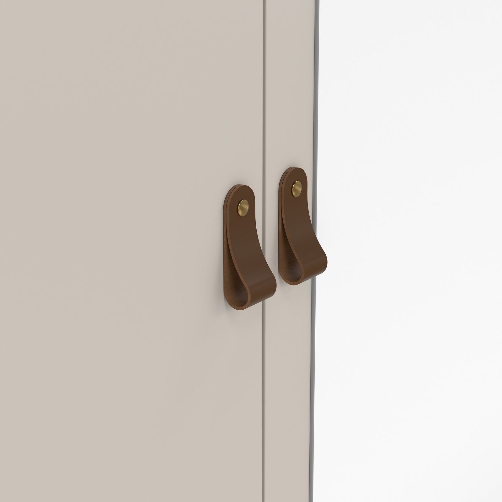 Beige wardrobe with two brown leather handles and brass fasteners