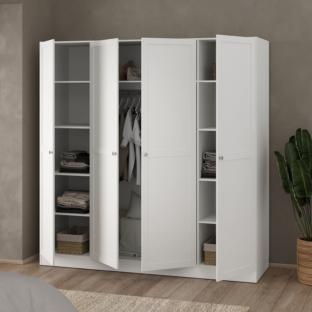 White 4 door wardrobe with open doors showing shelves with folded clothes, hanging rail and baskets.
