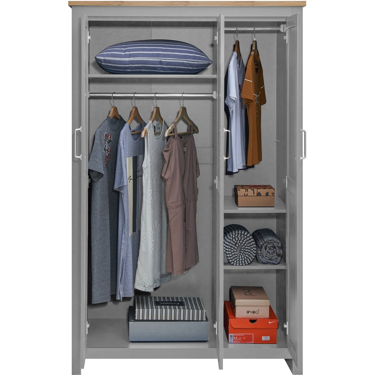 Light grey 3 door wardrobe interior with hanging clothes, pillow and storage boxes