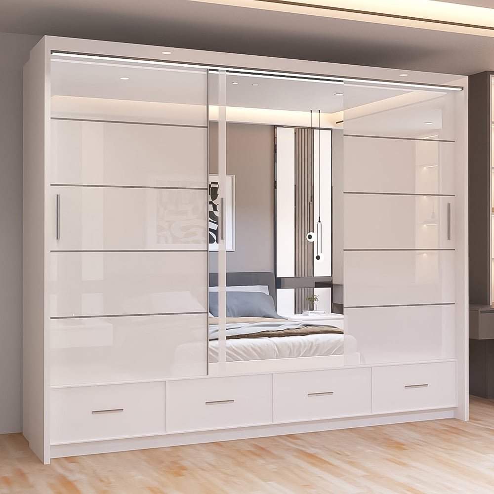 White gloss 255cm sliding wardrobe with mirrored doors and four drawers, reflecting a bedroom interior.