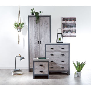 Grey 3-piece bedroom set: two-door wardrobe, four-drawer chest, and two-drawer bedside table with distressed wood effect.