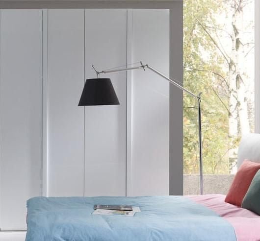 Italia 4-door wardrobe in white gloss with modern floor lamp over bed