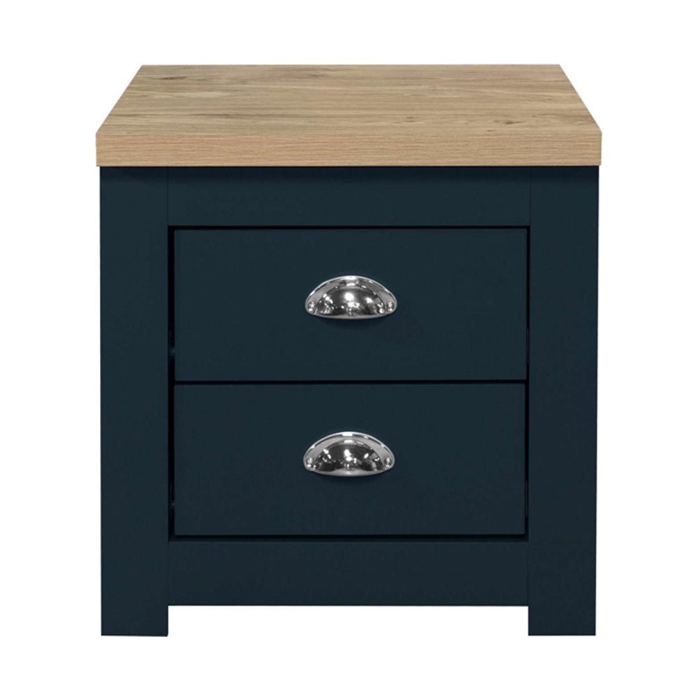 Navy blue wooden bedside cabinet with oak-effect top and two drawers with silver cup handles.