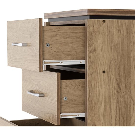 Crieff Narrow Wooden Chest of 5 Drawers in Oak Effect, showing two open drawers with metal runners and silver handles.