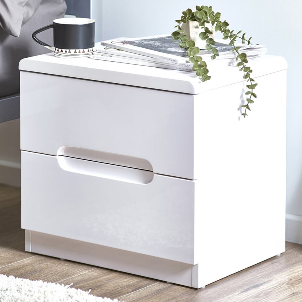 MANHATTAN 2 Drawer White High Gloss Bedside Table with magazines, cup, and plant