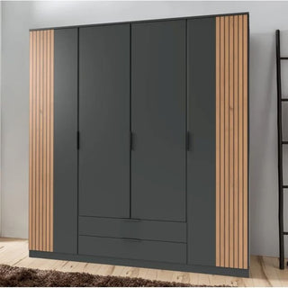 NOMASA 4-door grey wardrobe with oak effect wood panel accents and two visible drawers.