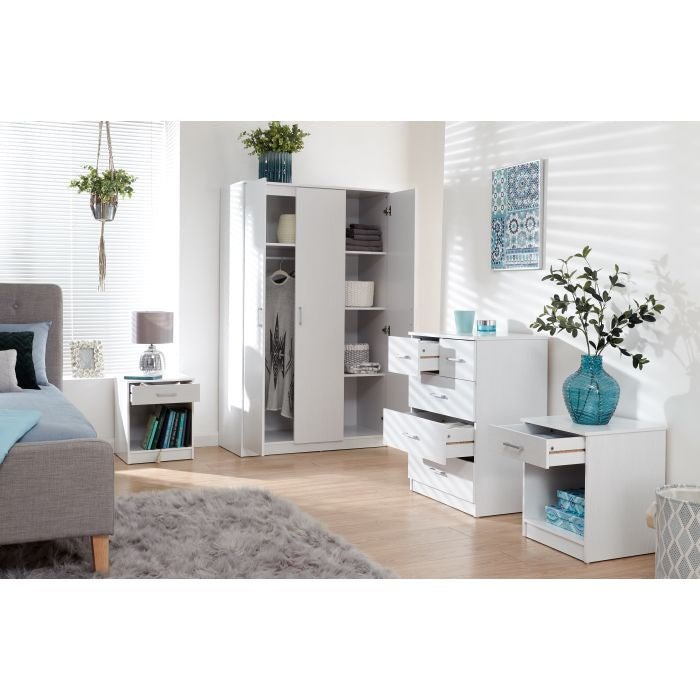 White 3 door wardrobe, 5 drawer chest, and 2 bedside tables bedroom set