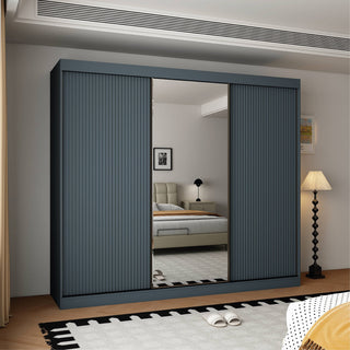 Dark grey 3-door sliding wardrobe with fluted panels and a mirrored centre door.