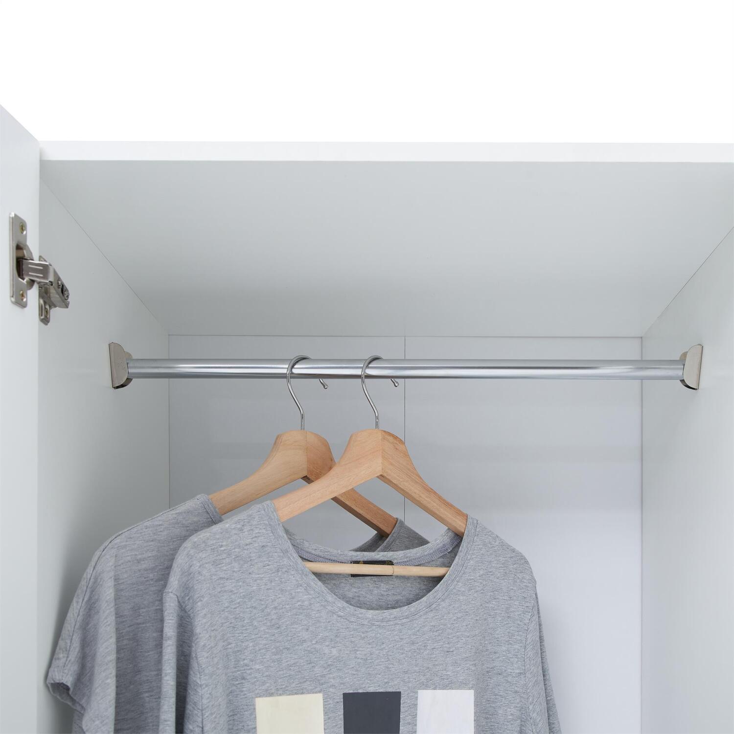Inside CHOICEWARDROBE Grafton 90 White 3 Door Wardrobe: metal rail with grey t-shirts on wooden hangers.