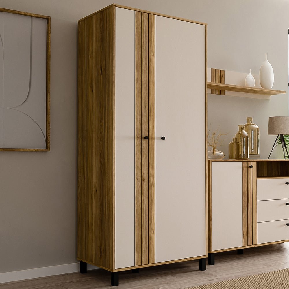 Florence Grafton 2-door cream and oak wardrobe next to a drawer cabinet.
